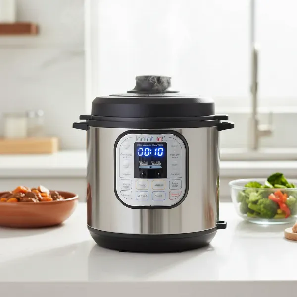 Instant Pot on a modern kitchen counter illustrating its various multi-cooker functions for diverse meals.
