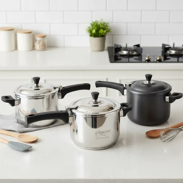 Assortment of Pigeon brand pressure cookers made from aluminum and stainless steel, some with induction bases and different lid designs.